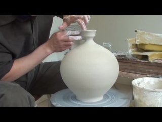 large pot-bellied vase in textured porcelain. special technique shaping using liquid glass (can