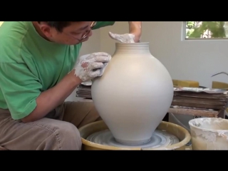 round vase with a narrow neck.